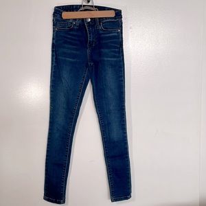 Joe’s Jeans, stretchy skinny jeans in dark denim, low rise size 24.